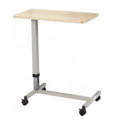 Träbord över sängen